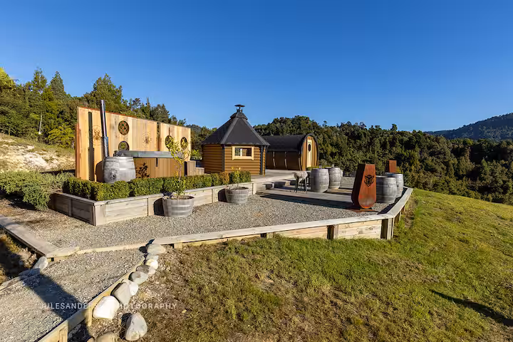Freyja barrel cabin and its private outdoor area surrounded by native bush